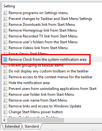 find and double click on remove clock from system notification area